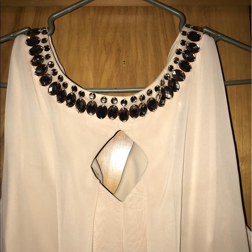 Cream colored dress.